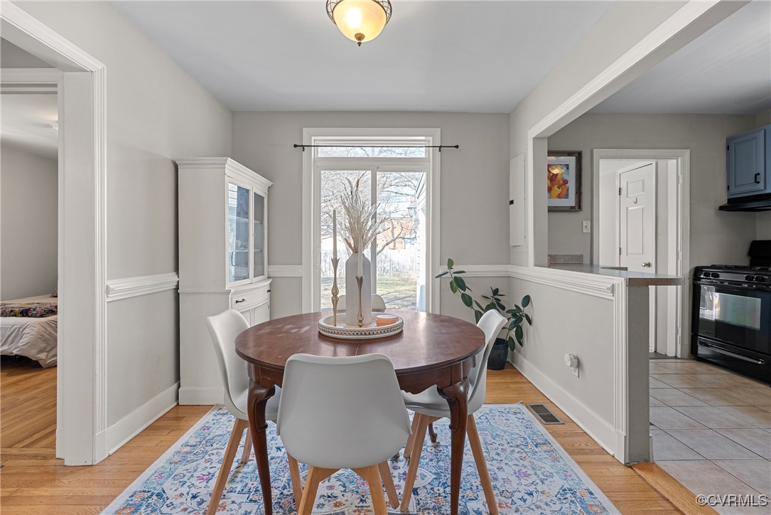 1918 Seddon Road Richmond, VA 23227 - Photo 8 of 33 Dining room with wood floors, sliding glass door