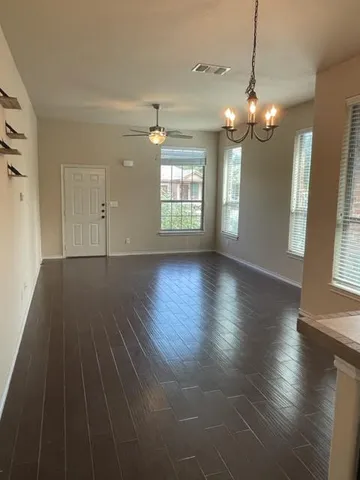 a view of livingroom with hardwood floor and window