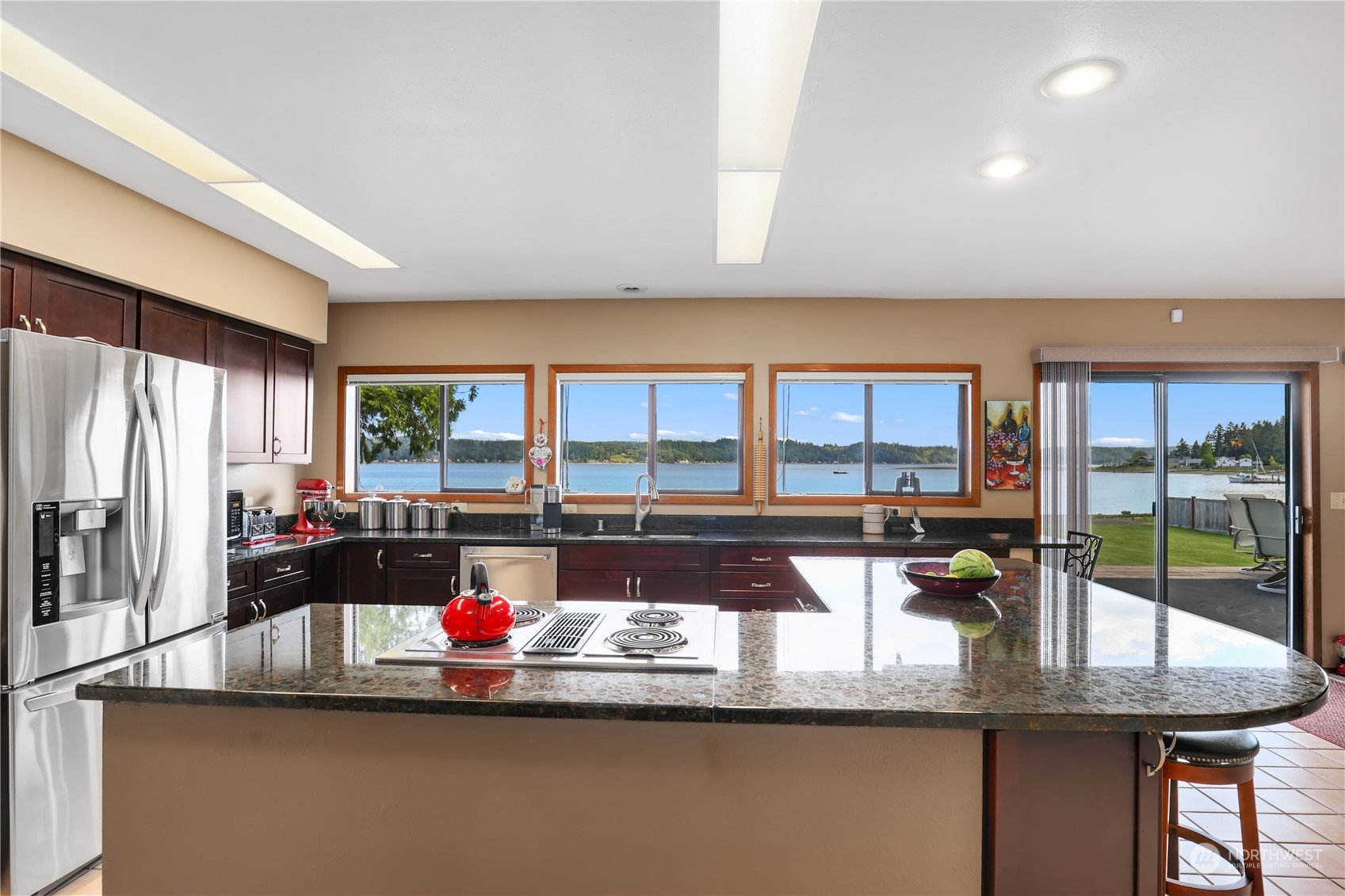 101 Northeast Sundstrom Road Belfair, WA 98528 - Photo 13 of 40 a kitchen with counter top space and living room