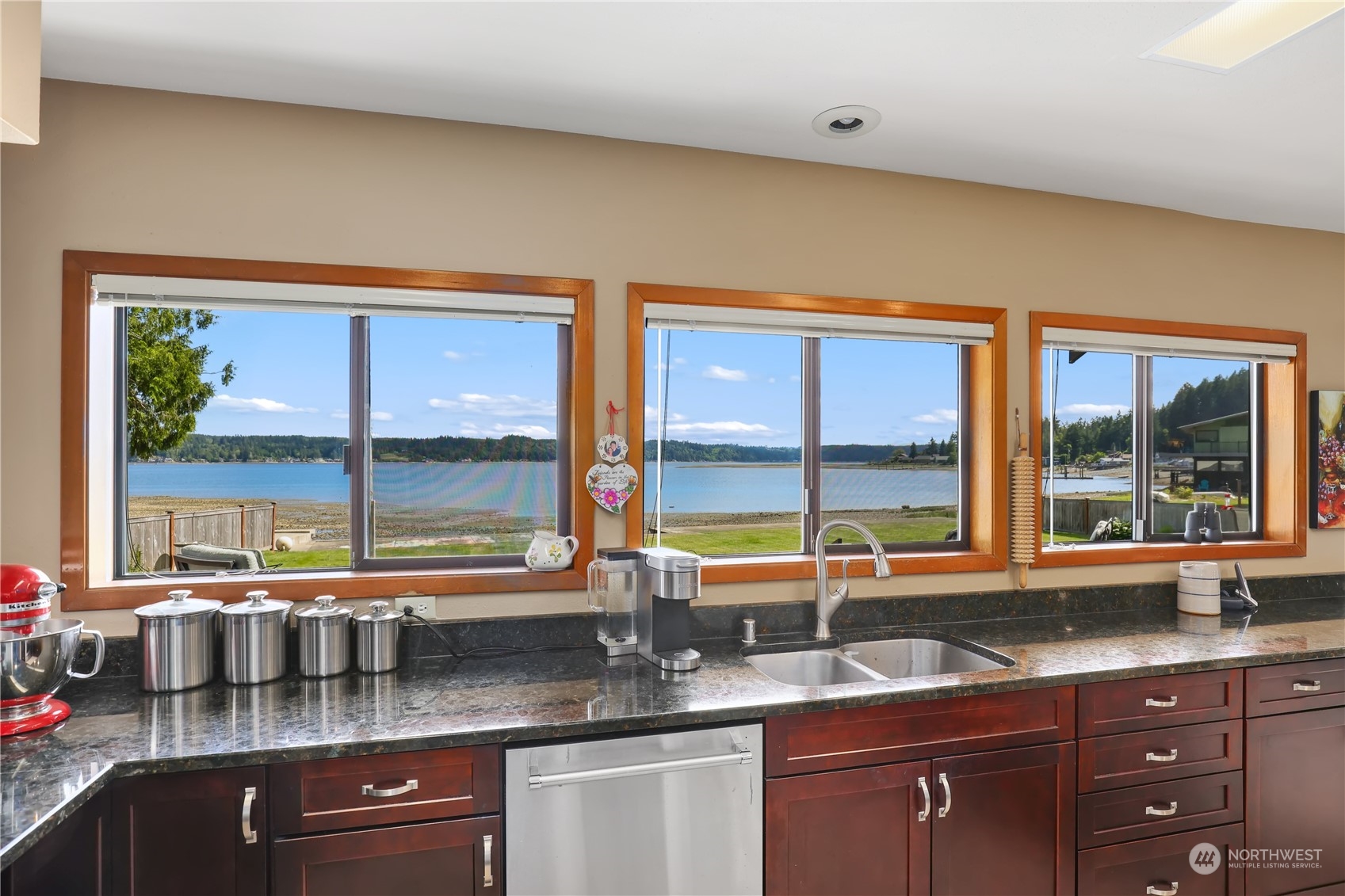 101 Northeast Sundstrom Road Belfair, WA 98528 - Photo 15 of 40 a kitchen with a sink and large window