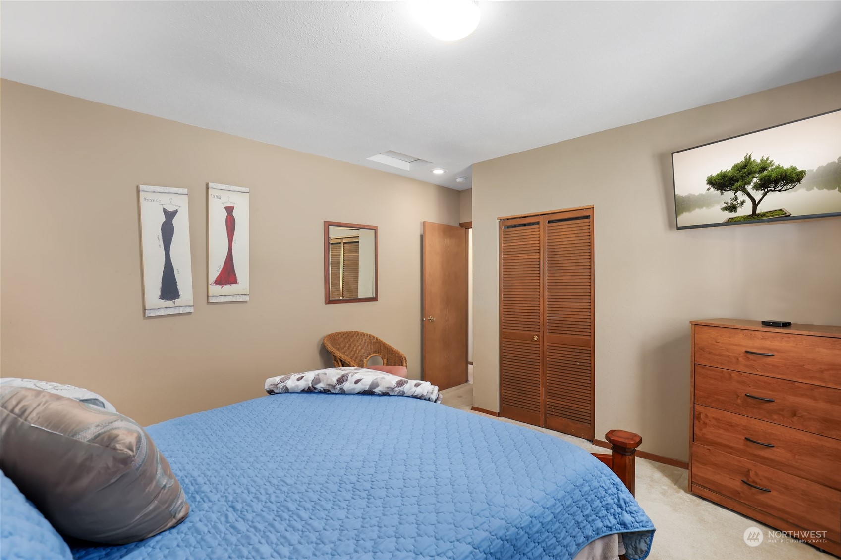 101 Northeast Sundstrom Road Belfair, WA 98528 - Photo 24 of 40 a bedroom with a bed and a window