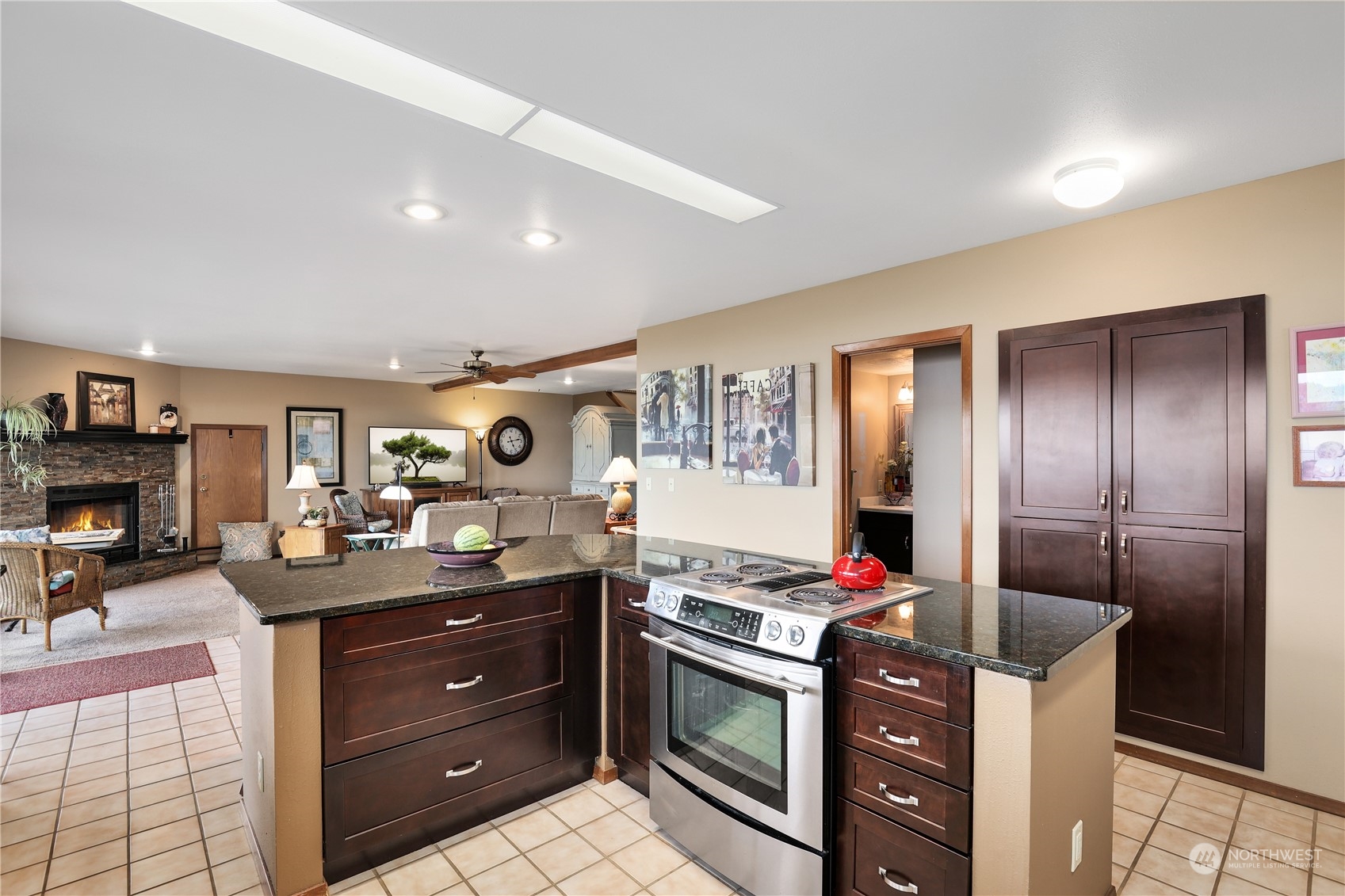 101 Northeast Sundstrom Road Belfair, WA 98528 - Photo 9 of 40 a kitchen with stainless steel appliances granite countertop a stove and a refrigerator
