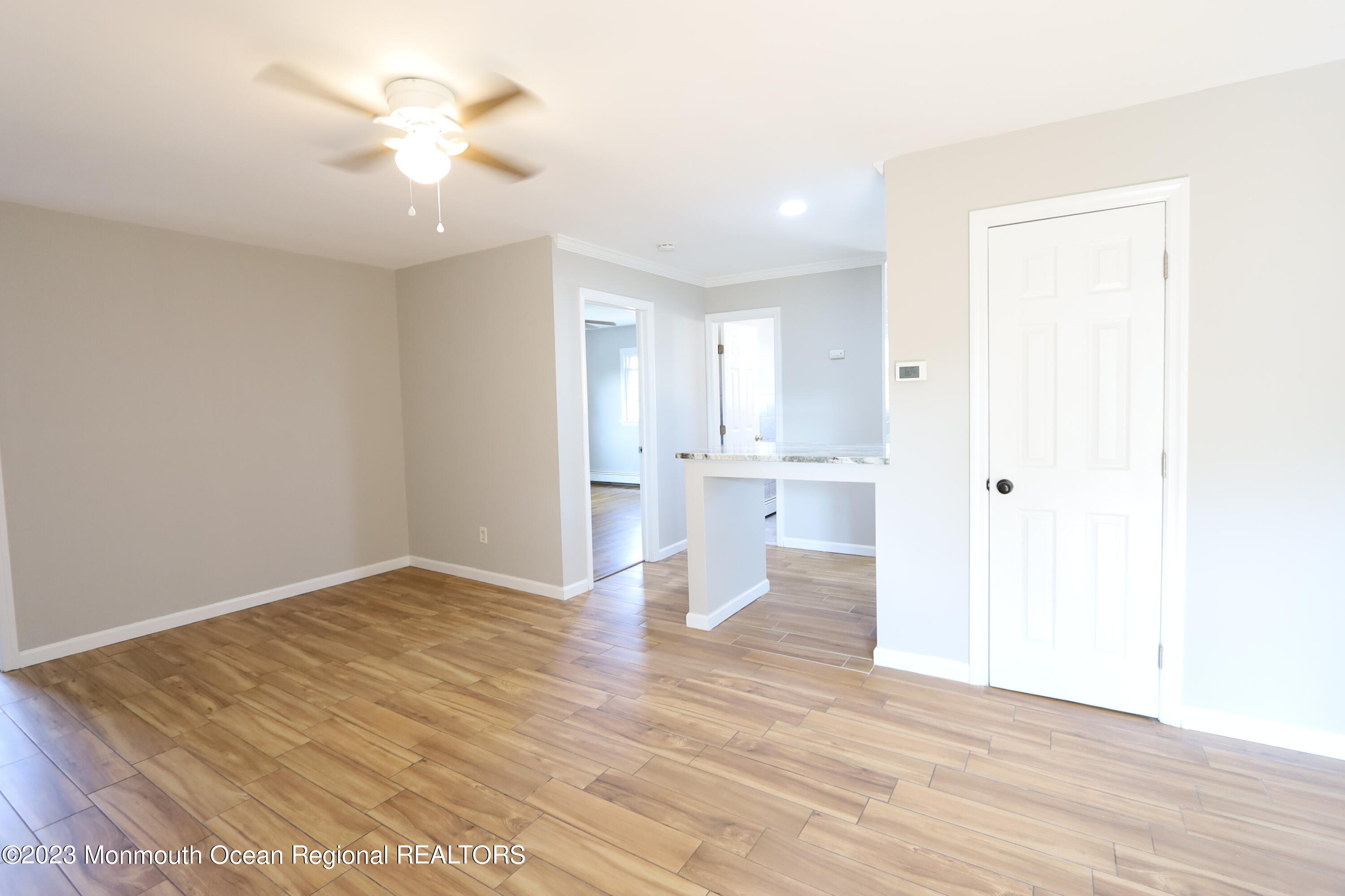 110 Union Avenue, Unit C Lakehurst, NJ 08733 - Photo 3 of 7 a view of a kitchen with wooden floor