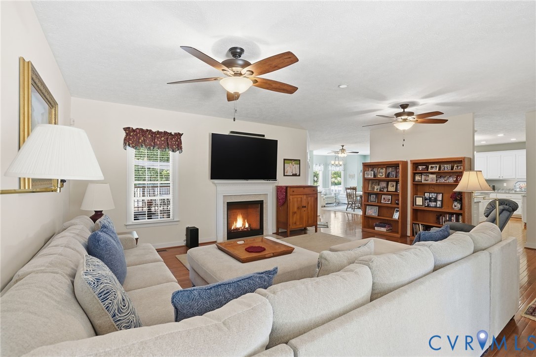 3600 Market Road Mechanicsville, VA 23111 - Photo 9 of 67 a living room with furniture ceiling fan and a fireplace