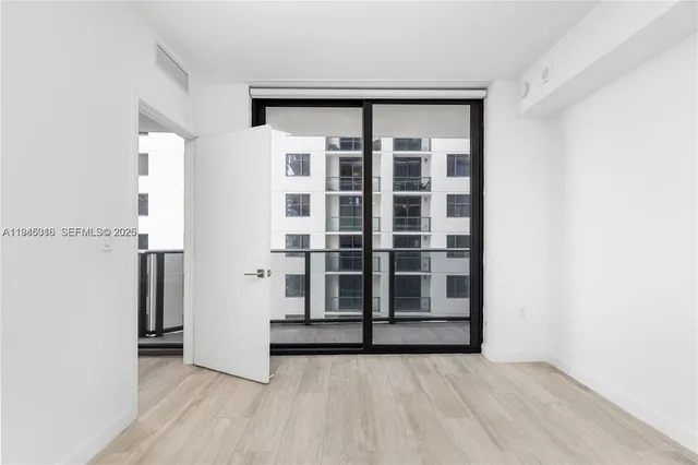 a bathroom with a toilet a sink and bathtub