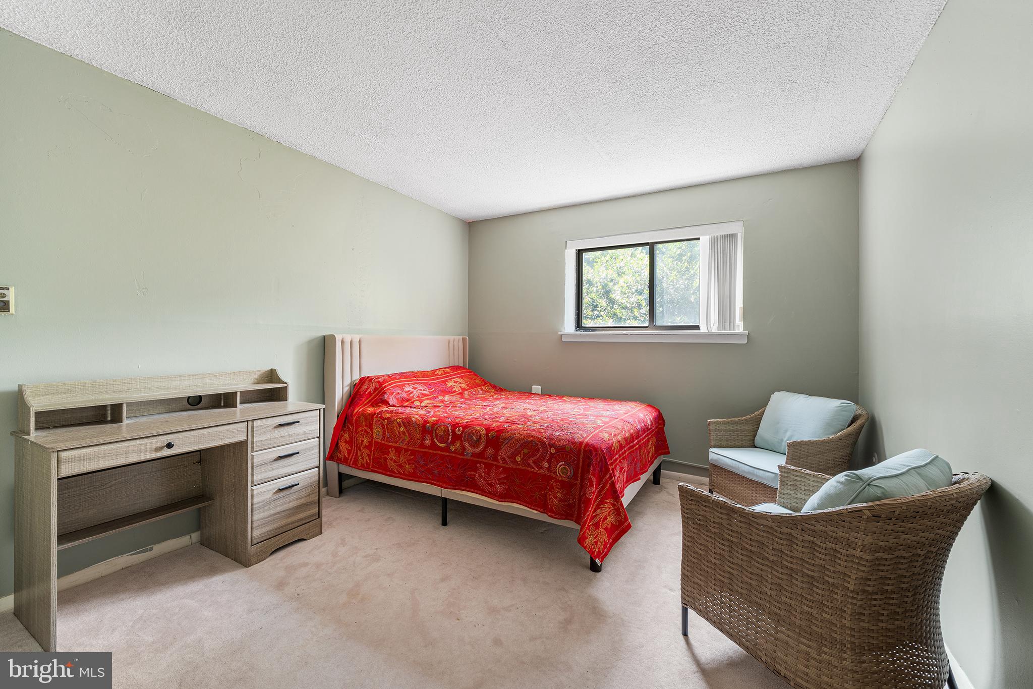 400 Glendale Road, Unit H30 Havertown, PA 19083 - Photo 14 of 22 a bedroom with a bed and a couch