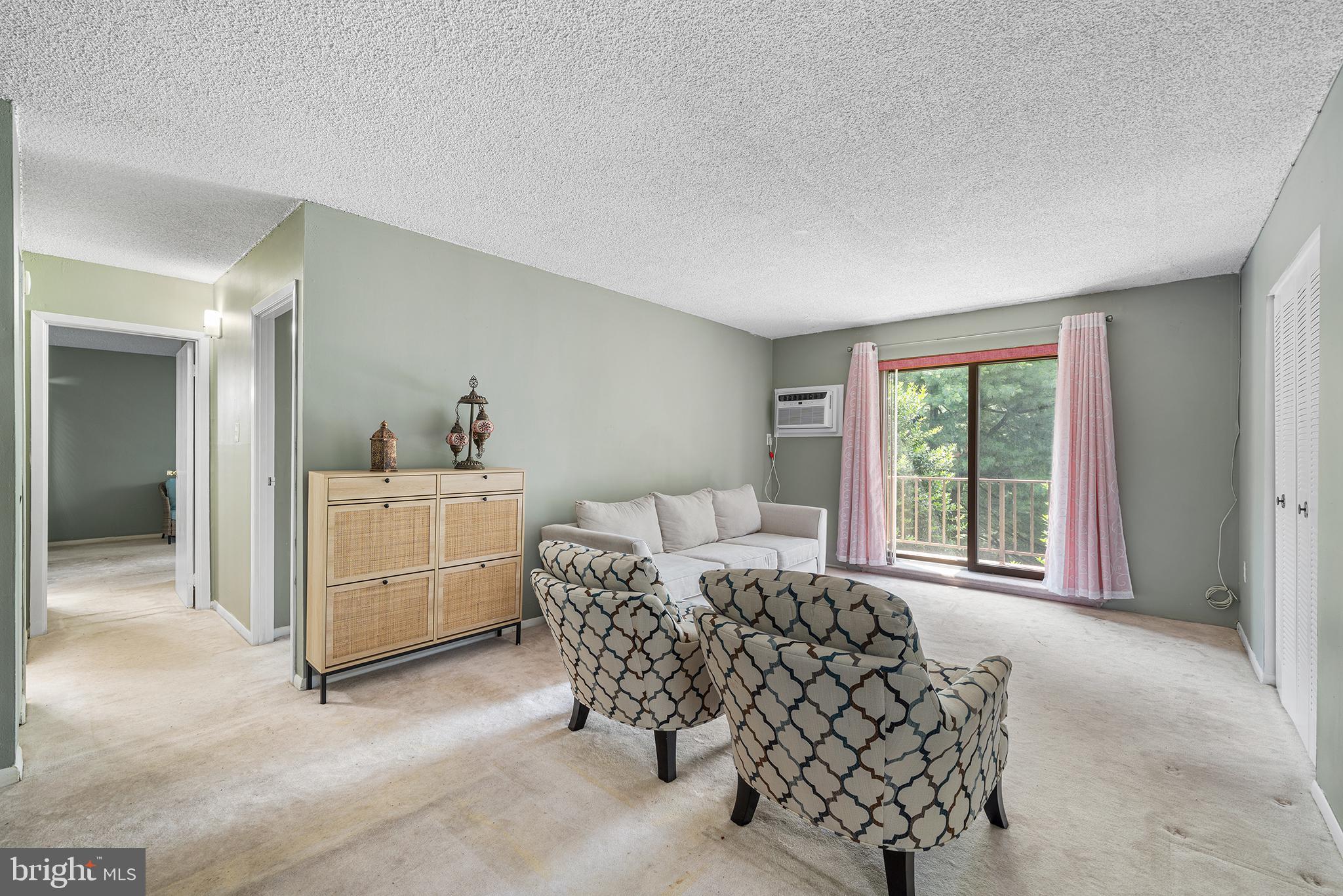 400 Glendale Road, Unit H30 Havertown, PA 19083 - Photo 4 of 22 a bedroom with furniture and a large window
