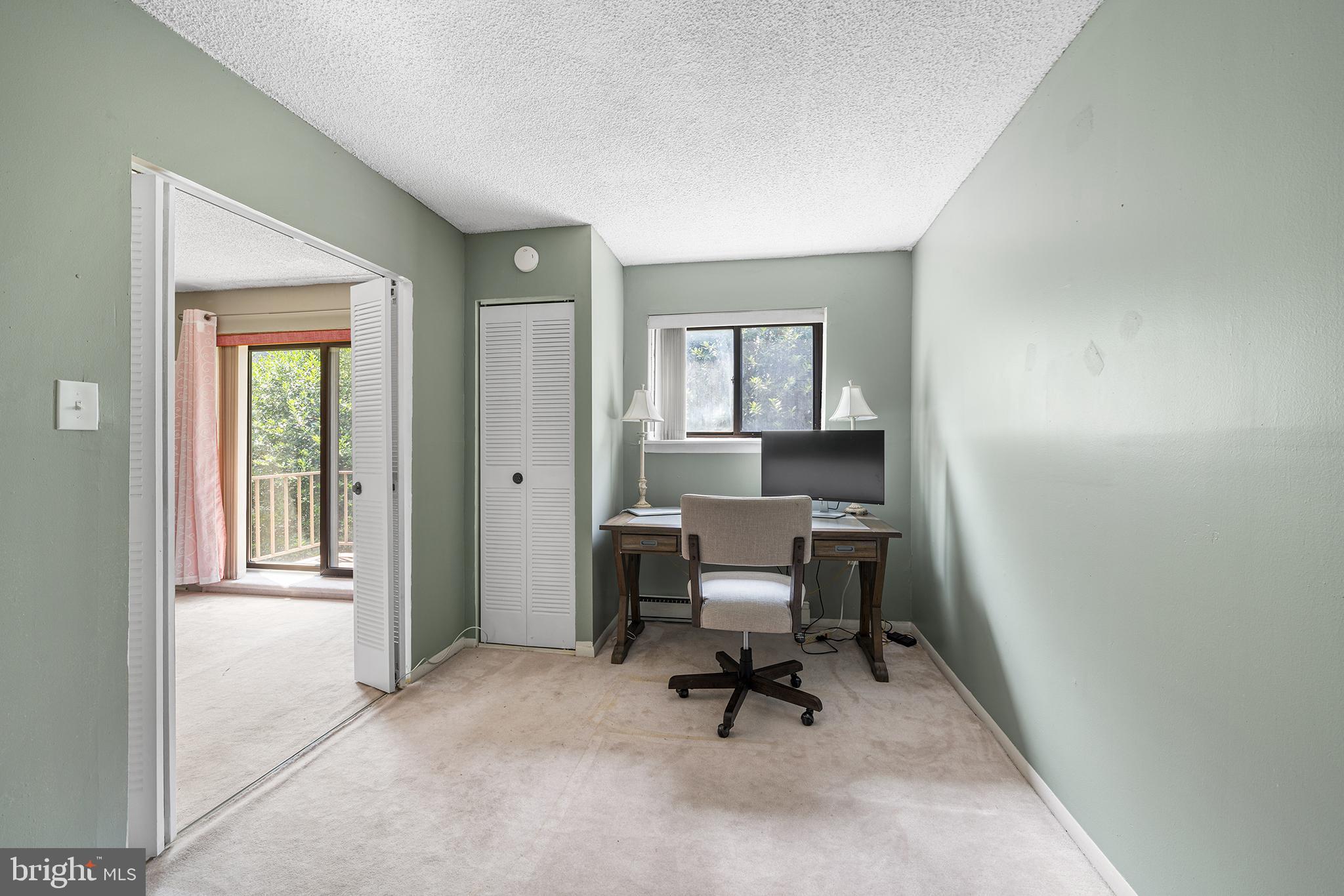400 Glendale Road, Unit H30 Havertown, PA 19083 - Photo 8 of 22 a view of a workspace with furniture and a window