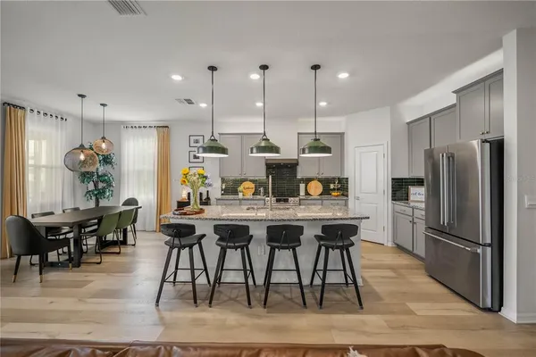 a living room with furniture and a table