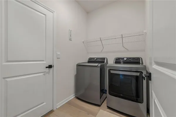 a balcony with furniture and city view