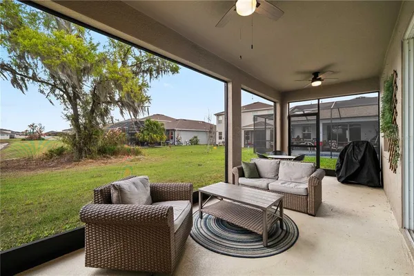 a front view of a house with a garden and yard