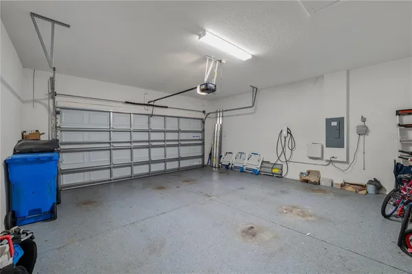 an aerial view of a house with a ocean view