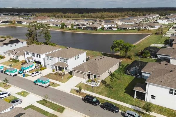 an aerial view of a house with a swimming pool