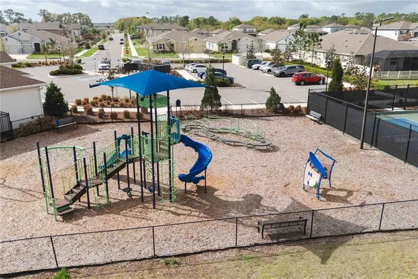a picture of a room with a cabinet and mirror