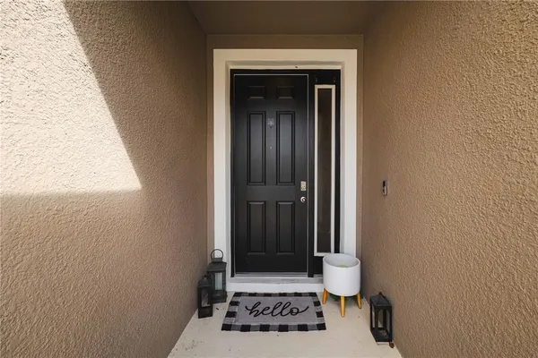 a hallway with view of living room