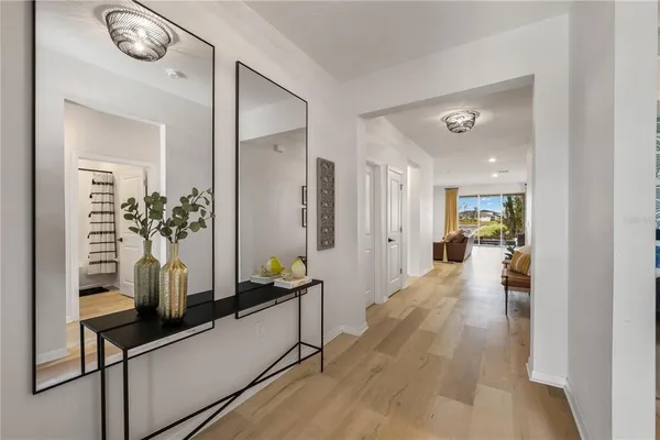 a view of entryway with wooden floor