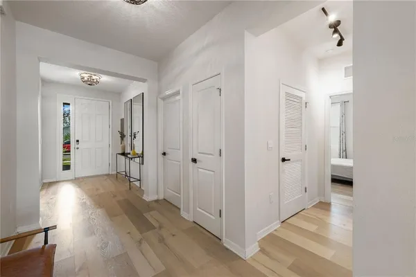 a kitchen with appliances cabinets and a counter space