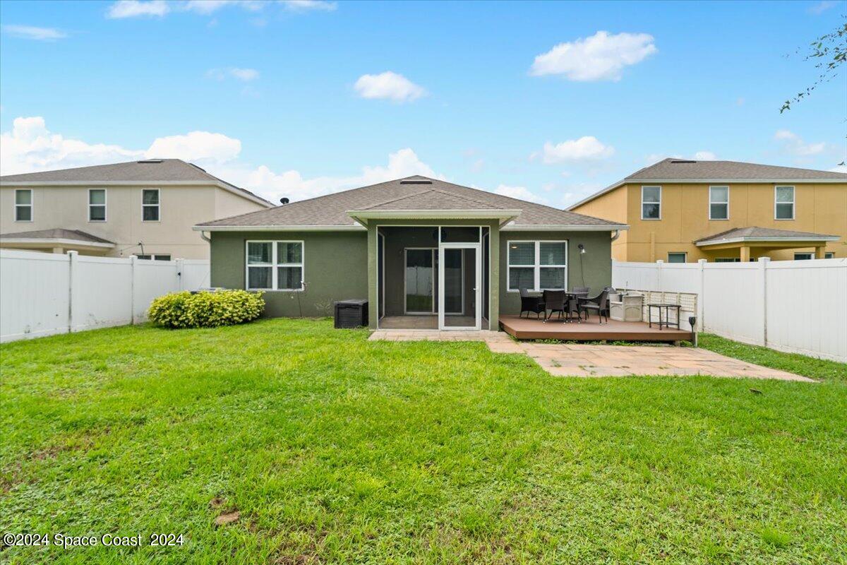 4332 Starling Place Mims, FL 32754 - Photo 23 of 28 a house view with swimming pool and garden space