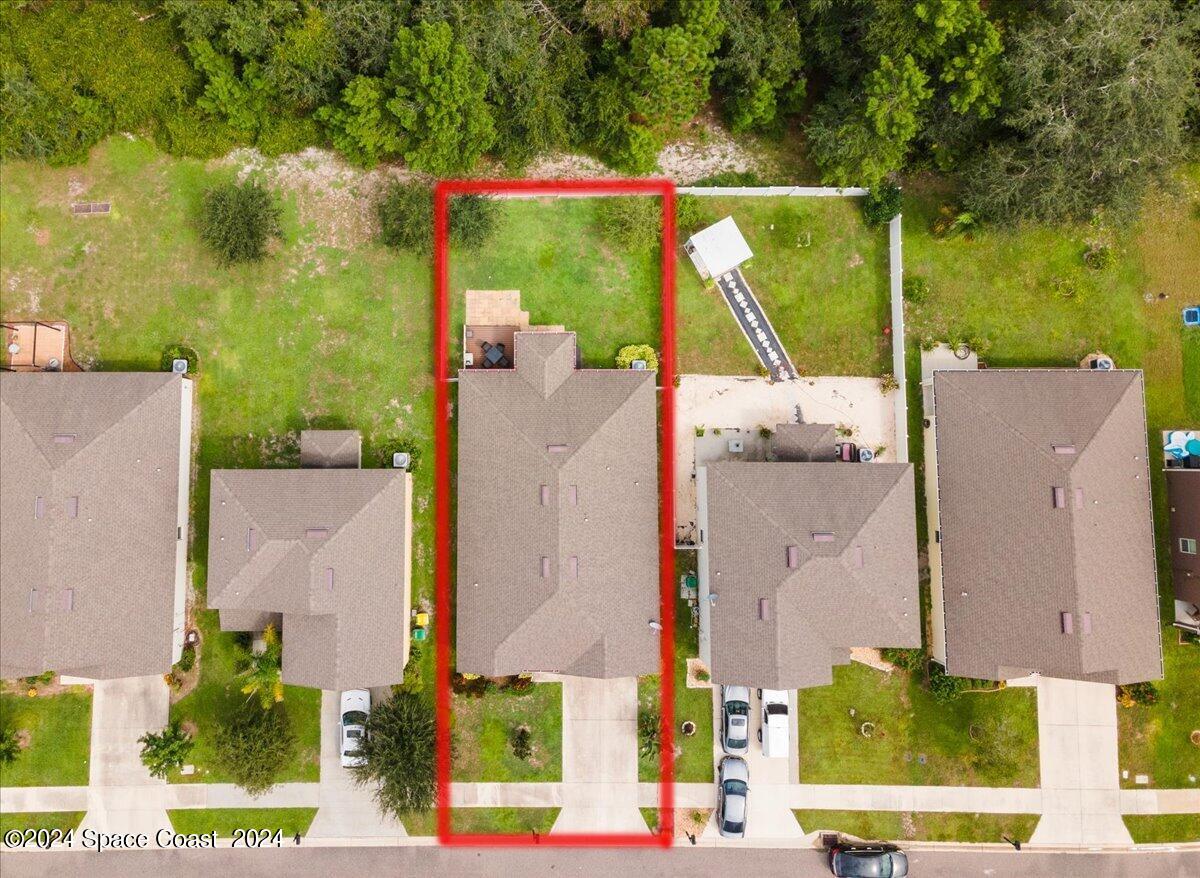 4332 Starling Place Mims, FL 32754 - Photo 27 of 28 an aerial view of residential house with outdoor space and swimming pool