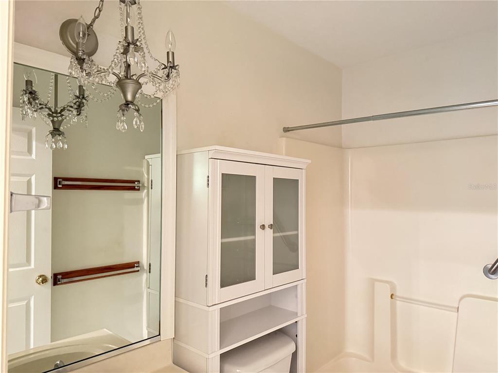 4262 Northeast 35th Avenue Road Ocala, FL 34479 - Photo 13 of 25 a view of a bathroom with a shower