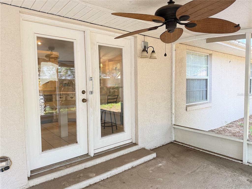 4262 Northeast 35th Avenue Road Ocala, FL 34479 - Photo 24 of 25 a view of a hallway with a glass door and a window