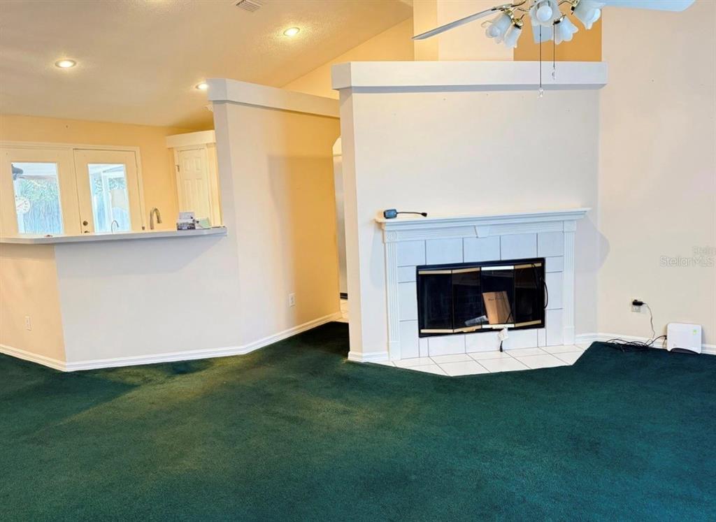 4262 Northeast 35th Avenue Road Ocala, FL 34479 - Photo 7 of 25 a room with a fireplace