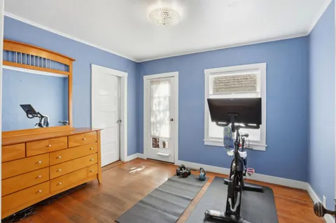 a view of a livingroom with furniture and a flat screen tv