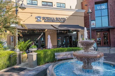 a view of a building with a street