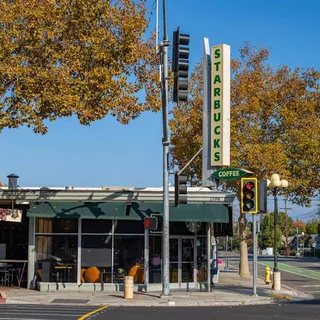 a view of a building with a street