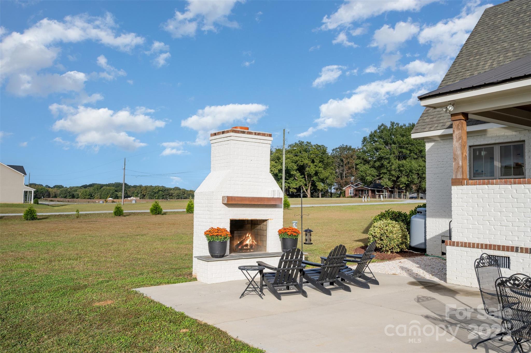 6322 Olive Branch Road Marshville, NC 28103 - Photo 24 of 28 a view of a lake with a patio