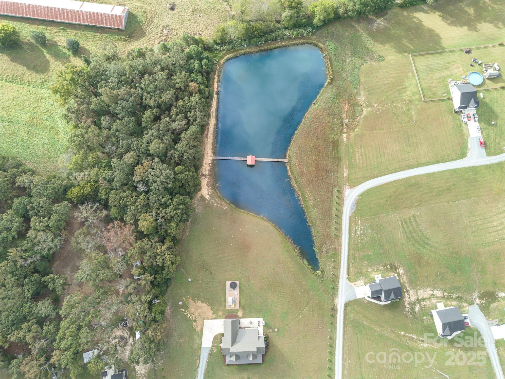 6322 Olive Branch Road Marshville, NC 28103 - Photo 27 of 28 an aerial view of a residential houses with outdoor space