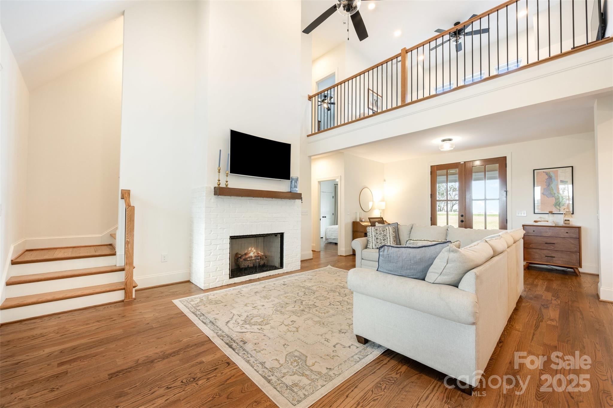 6322 Olive Branch Road Marshville, NC 28103 - Photo 4 of 28 a living room with furniture fireplace and flat screen tv