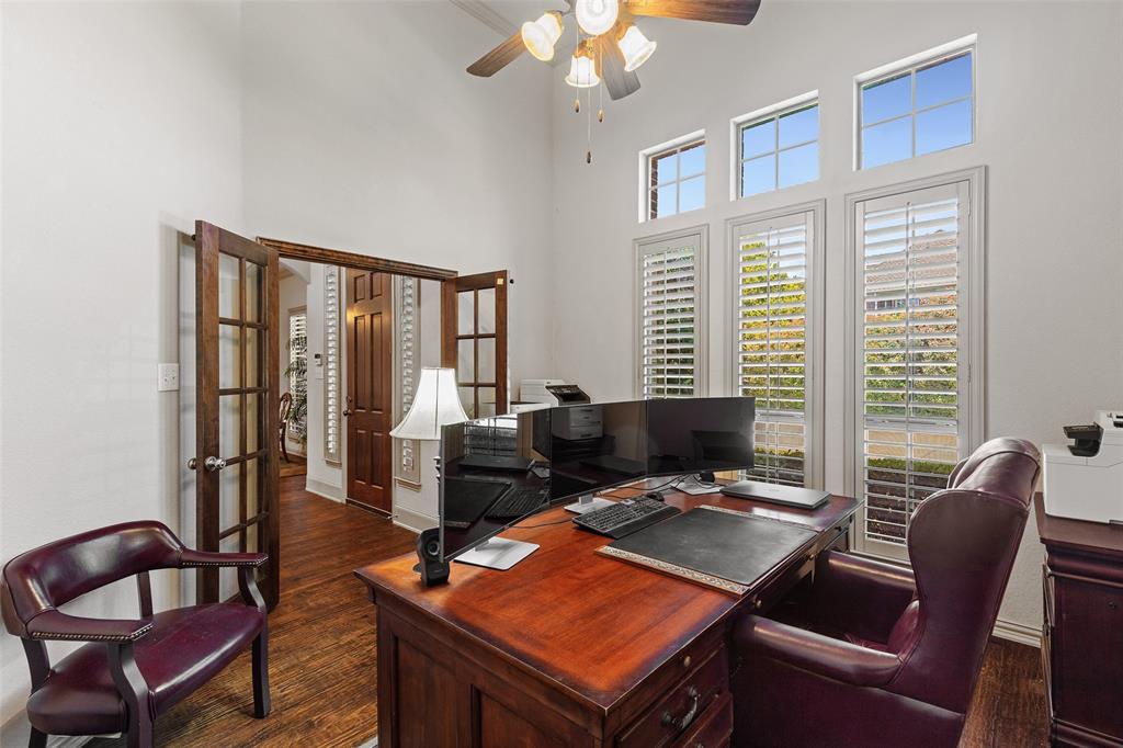 1217 Windmere Way Allen, TX 75013 - Photo 12 of 38 Natural light and plantation shutters give this refined study a calm, professional feel ideal for productivity or quiet reading.
