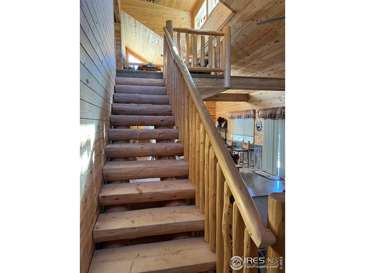 2880 Fire Rte 15 Bellvue, CO 80512 - Photo 20 of 40 Stairs to upper level