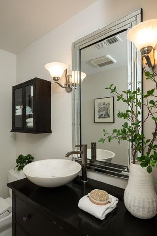 a room with furniture and a mirror