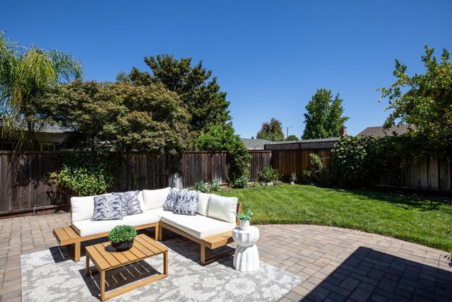 swimming wooden floor outdoor seating and green space