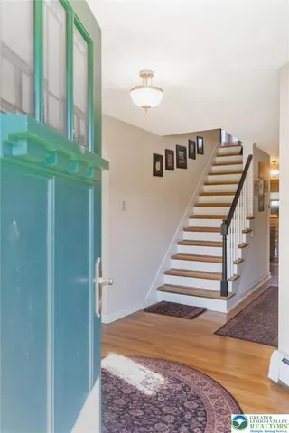 a view of a hallway with staircase