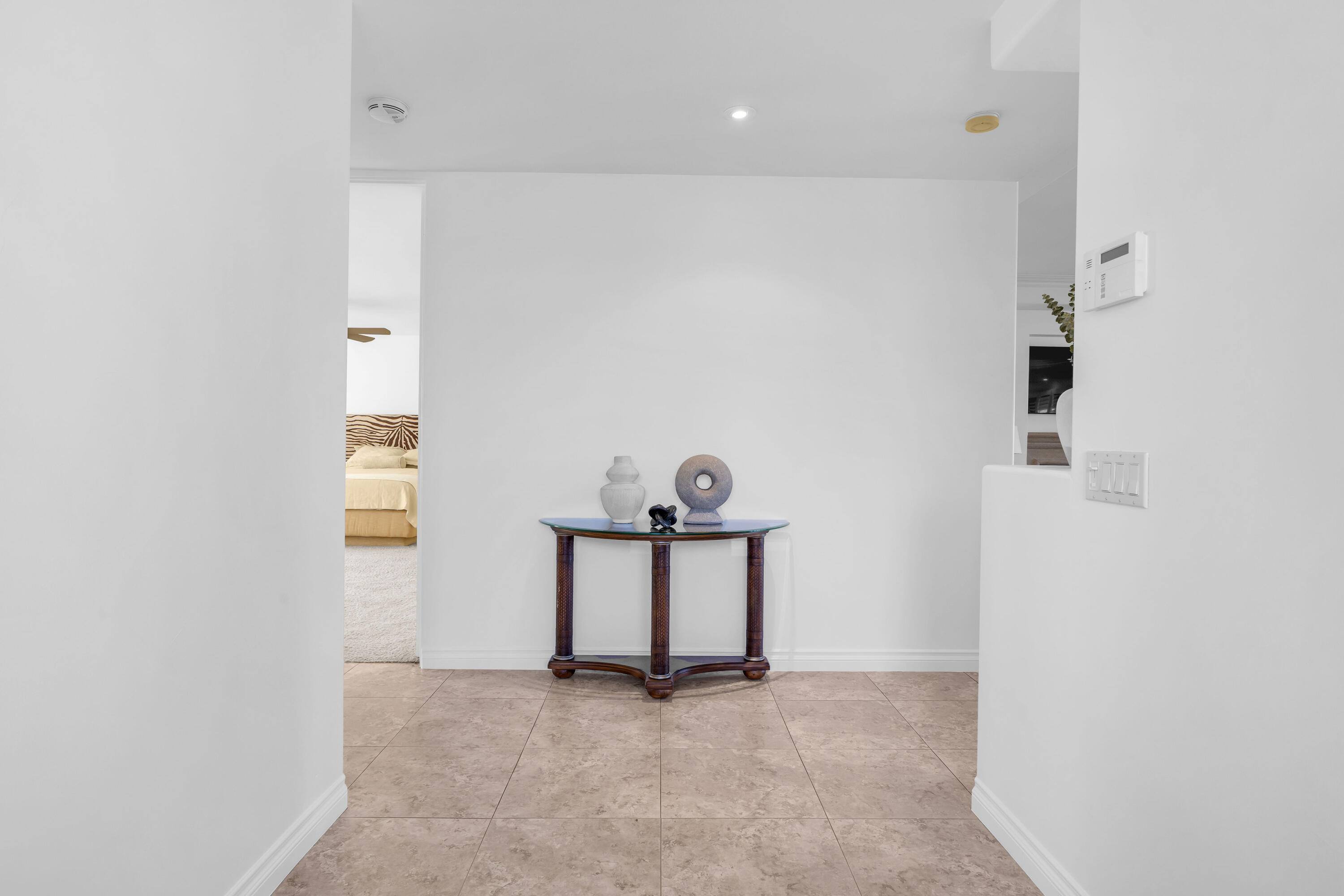 77690 Seminole Road Indian Wells, CA 92210 - Photo 15 of 59 a view of a livingroom with a table and chairs