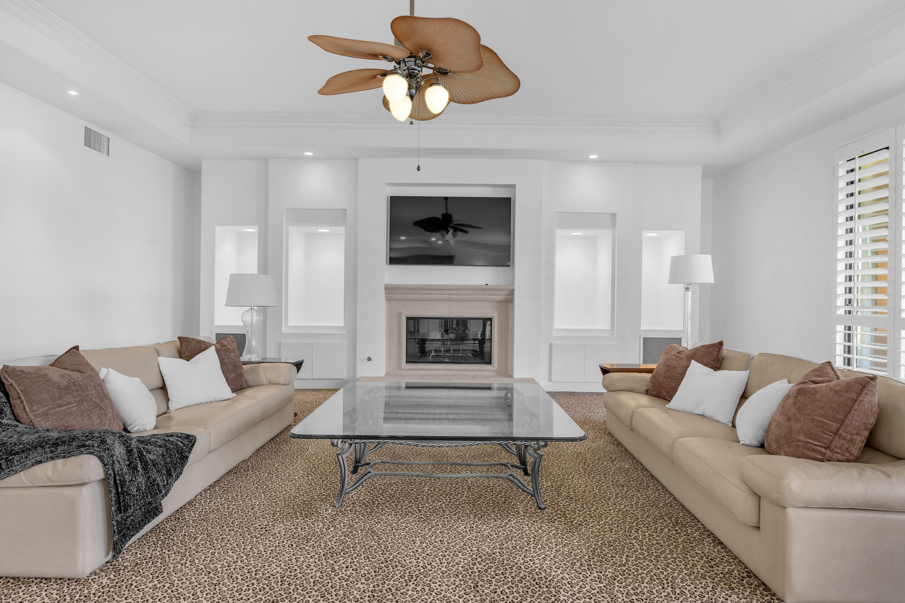 77690 Seminole Road Indian Wells, CA 92210 - Photo 18 of 59 a living room with furniture and a fireplace