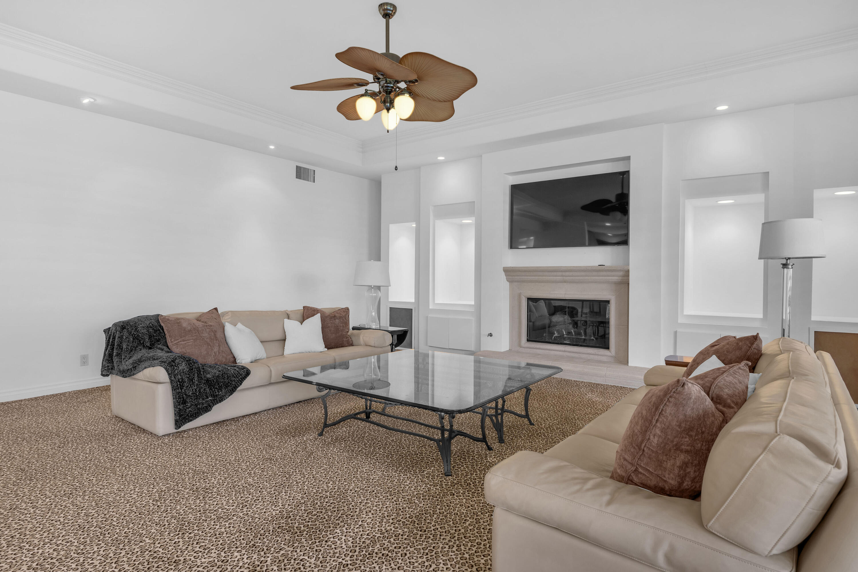 77690 Seminole Road Indian Wells, CA 92210 - Photo 19 of 59 a living room with furniture and a fireplace