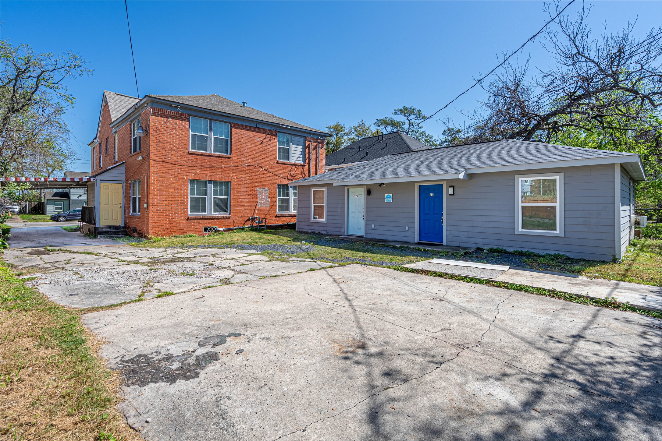 3420 Rosedale Street Houston, TX 77004 - Photo 10 of 11 a front view of a house with a yard