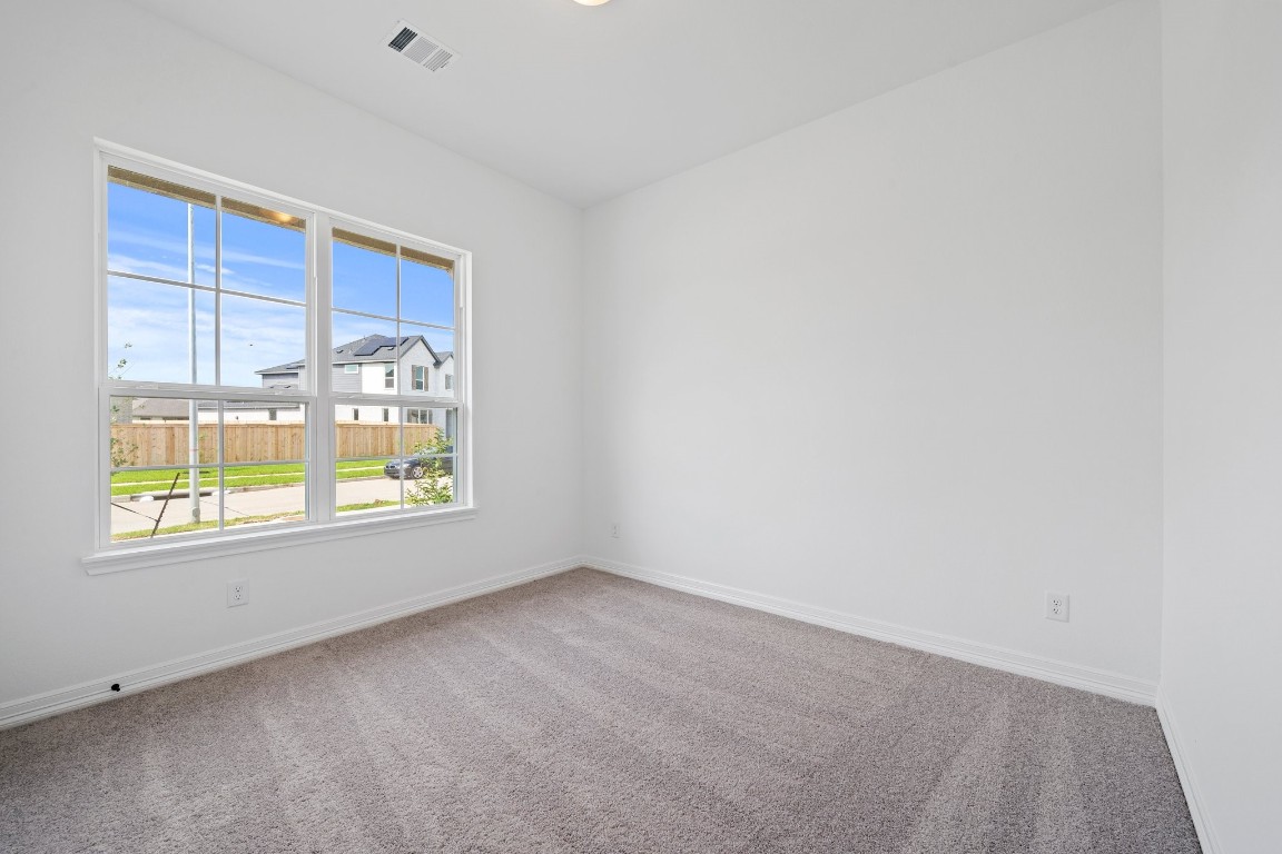 32107 Waterlily View Hockley, TX 77447 - Photo 13 of 21 an empty room with a window