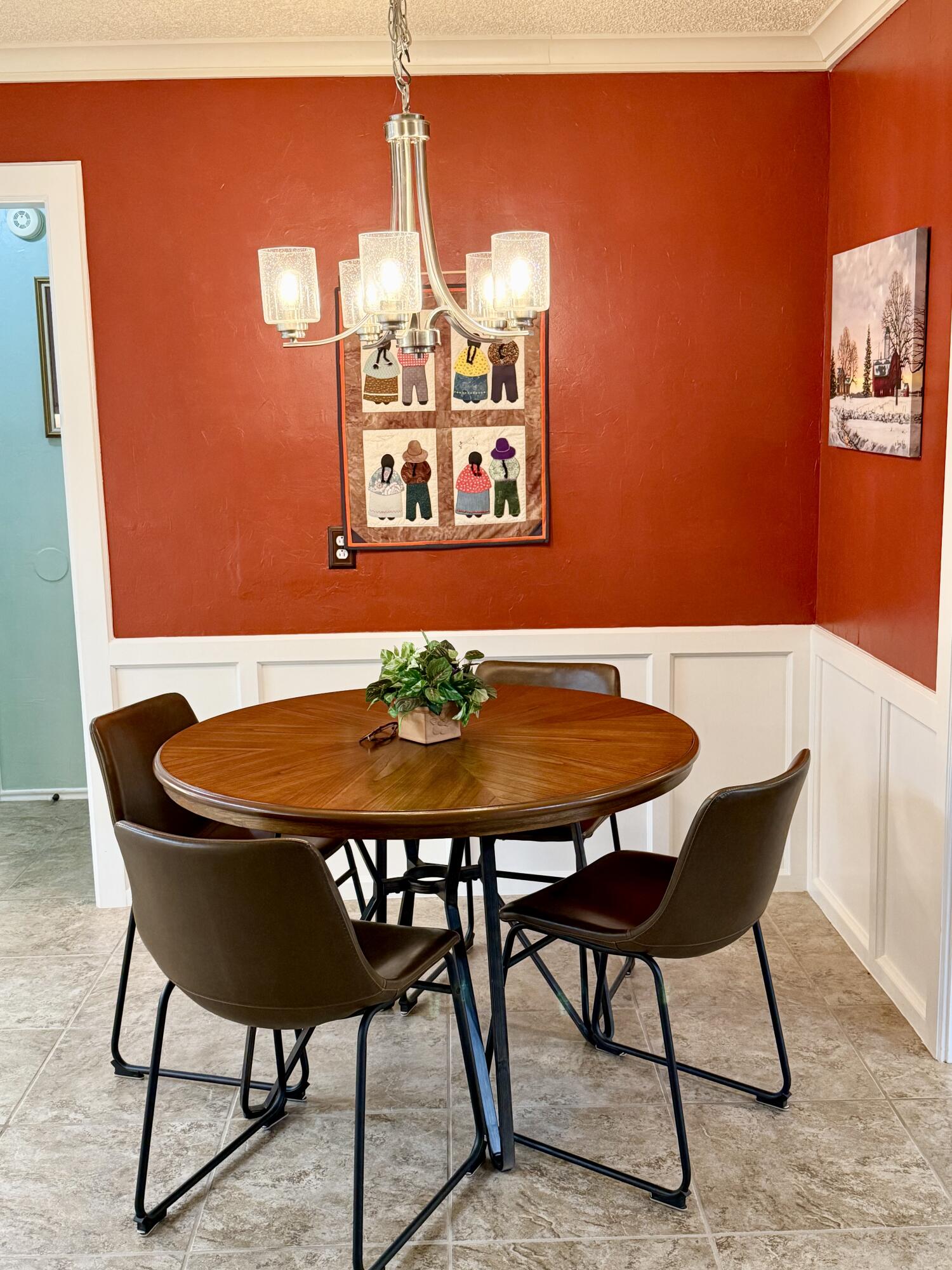 4911 92nd Street Lubbock, TX 79424 - Photo 32 of 77 a dining room with furniture and wooden floor