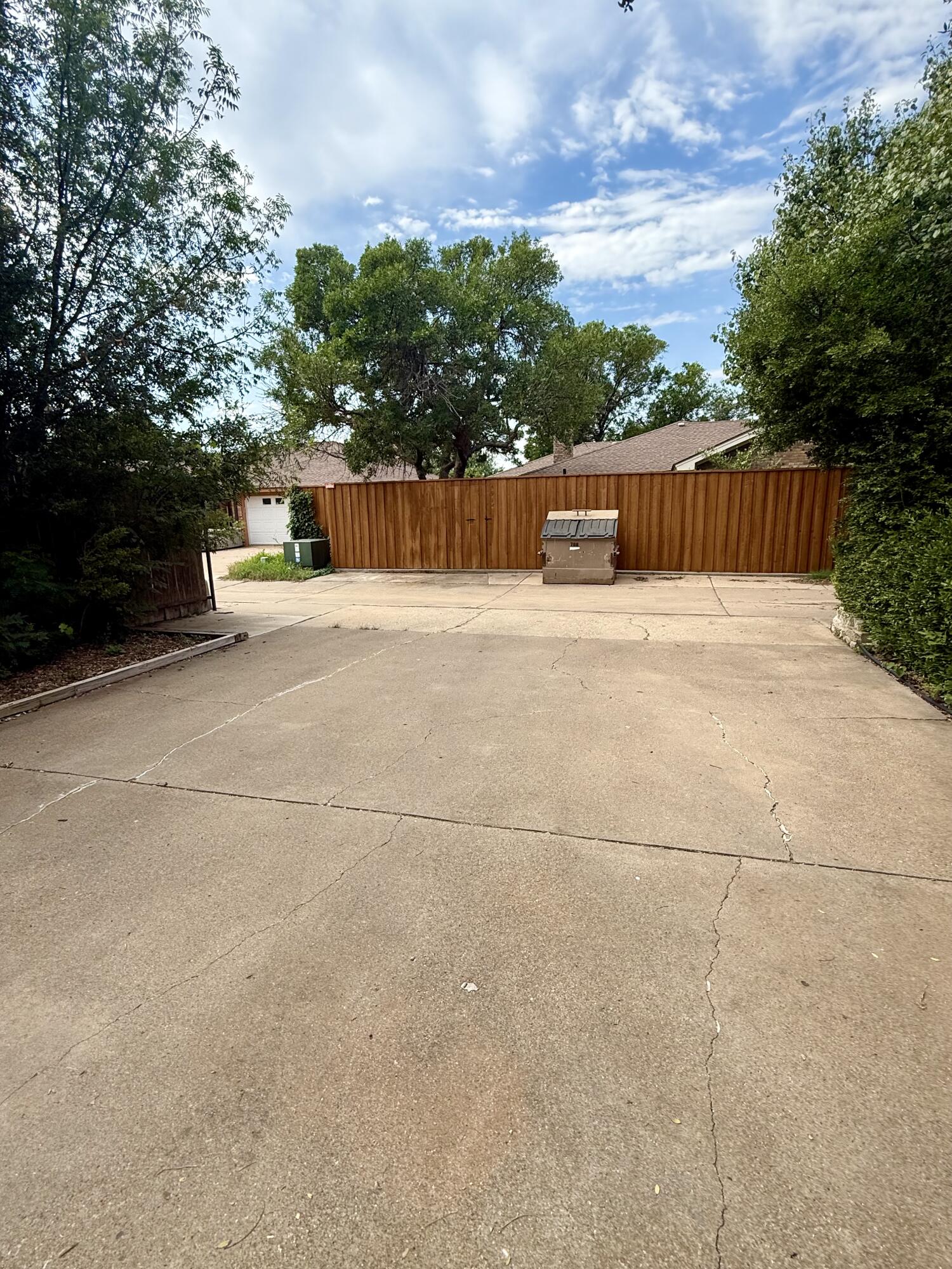 4911 92nd Street Lubbock, TX 79424 - Photo 76 of 77 a view of street with parked cars