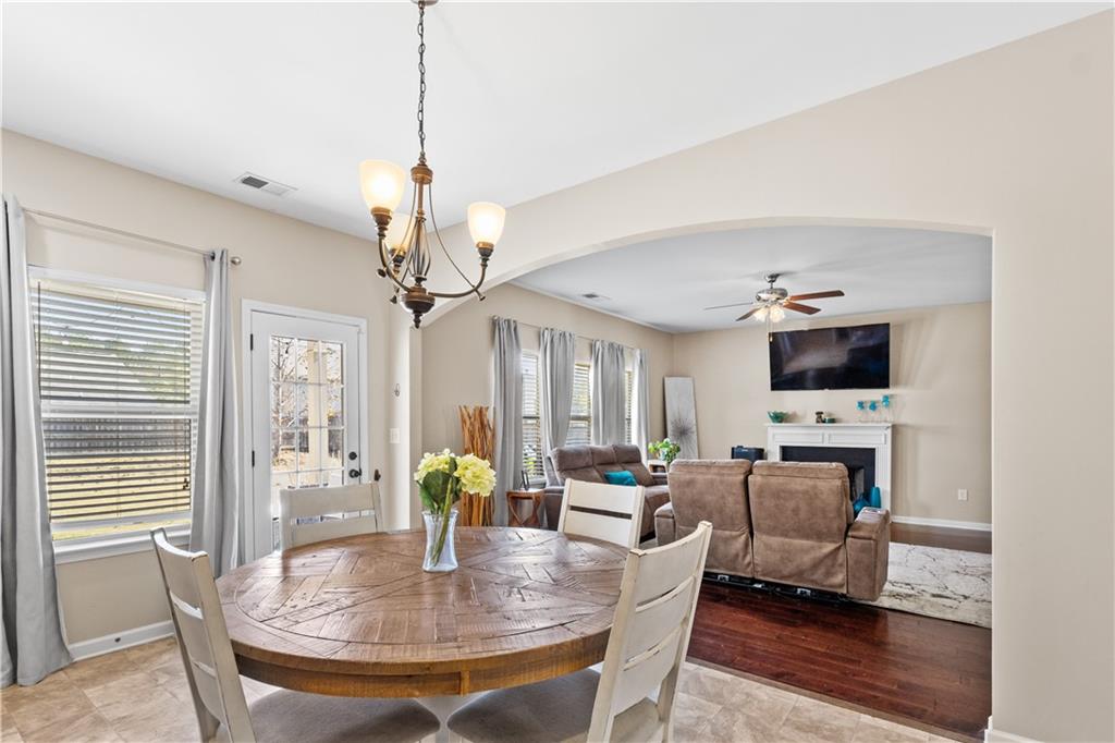 9116 Alden Drive Locust Grove, GA 30248 - Photo 13 of 27 a dining room with furniture and window