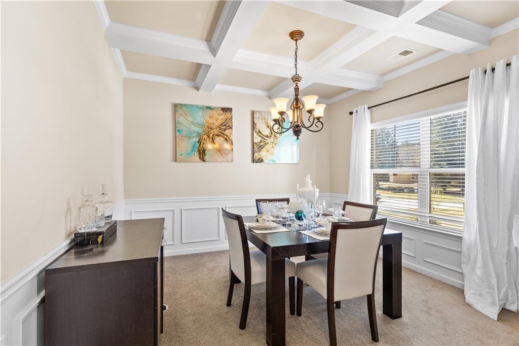 9116 Alden Drive Locust Grove, GA 30248 - Photo 6 of 27 a view of a dining room with furniture window and outside view