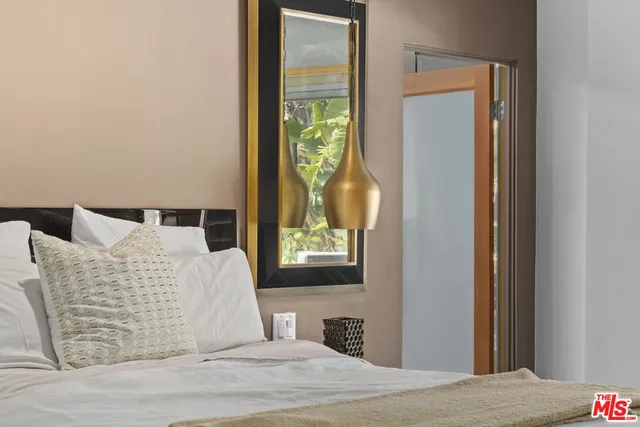 a view of entryway with flower and potted plants