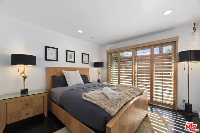 a view of a backyard with sitting area