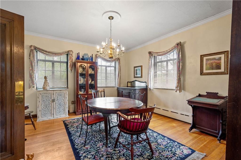 2 Crescent Drive Pittsburgh, PA 15228 - Photo 11 of 48 a dining room with furniture a chandelier and wooden floor