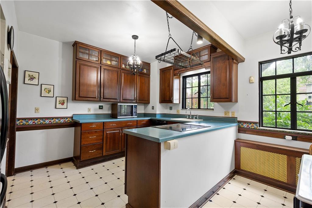 2 Crescent Drive Pittsburgh, PA 15228 - Photo 14 of 48 a kitchen with stainless steel appliances a sink a stove a refrigerator and cabinets